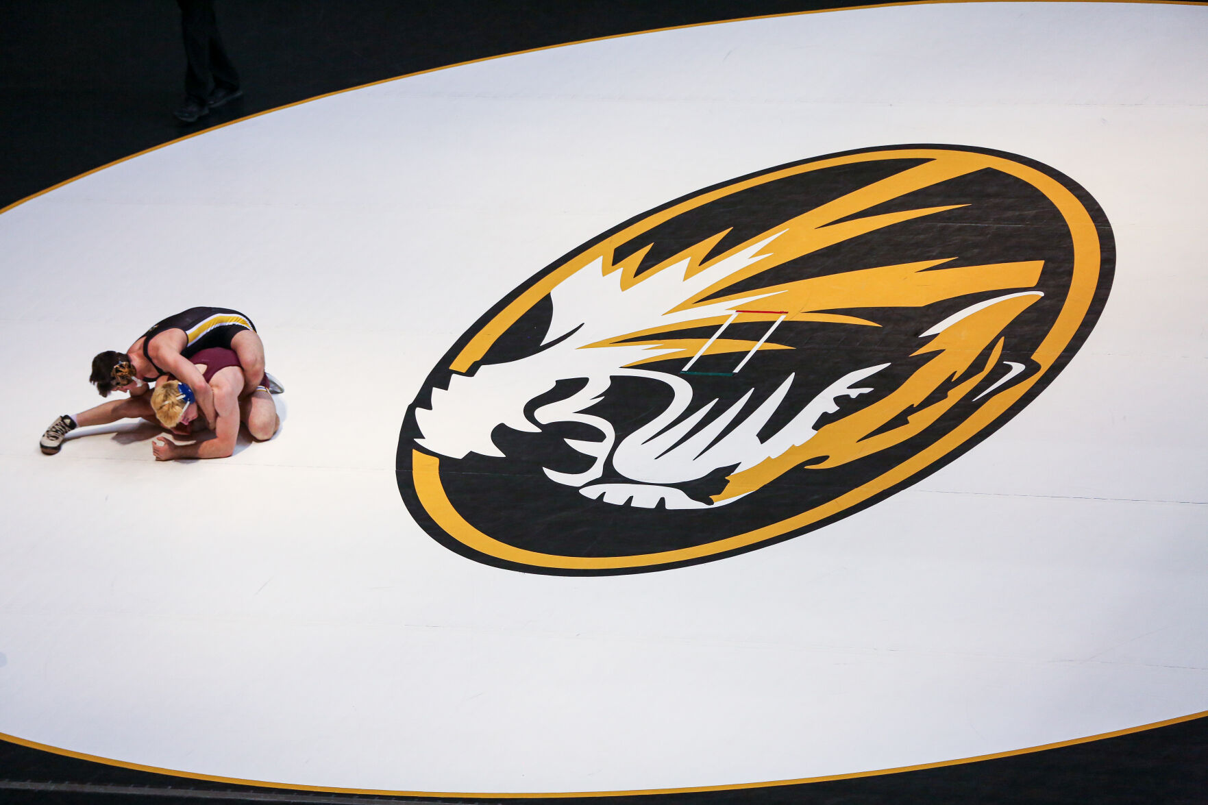 Missouri's Keegan O'Toole, top, grapples with Central Michigan's Alex Cramer